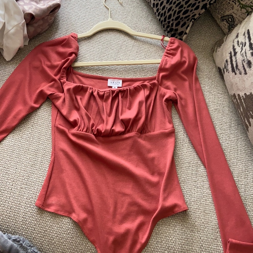 long sleeve pink body suit size medium